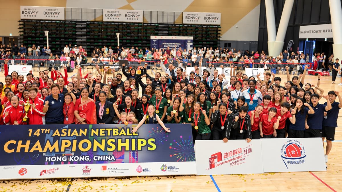 Teams and event personnel gather at the 2026 Asian Netball Championships in Kai Tak Arena