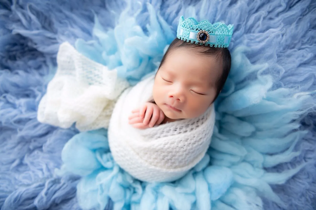 Newborn photography with soft studio light